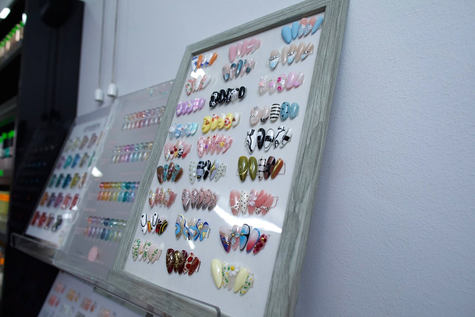 The design sample wall at Cathy Nail House